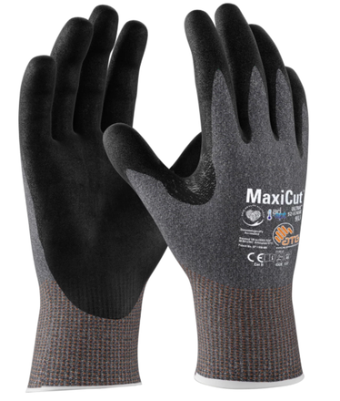 A pair of black and green maxiflex gloves