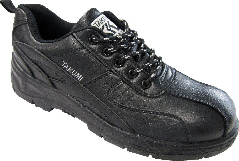 A pair of black takumi shoes on a white background