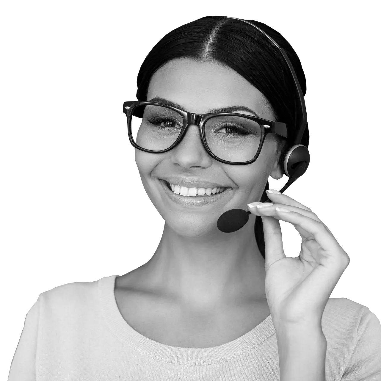 A woman wearing glasses and a headset is smiling in a black and white photo.