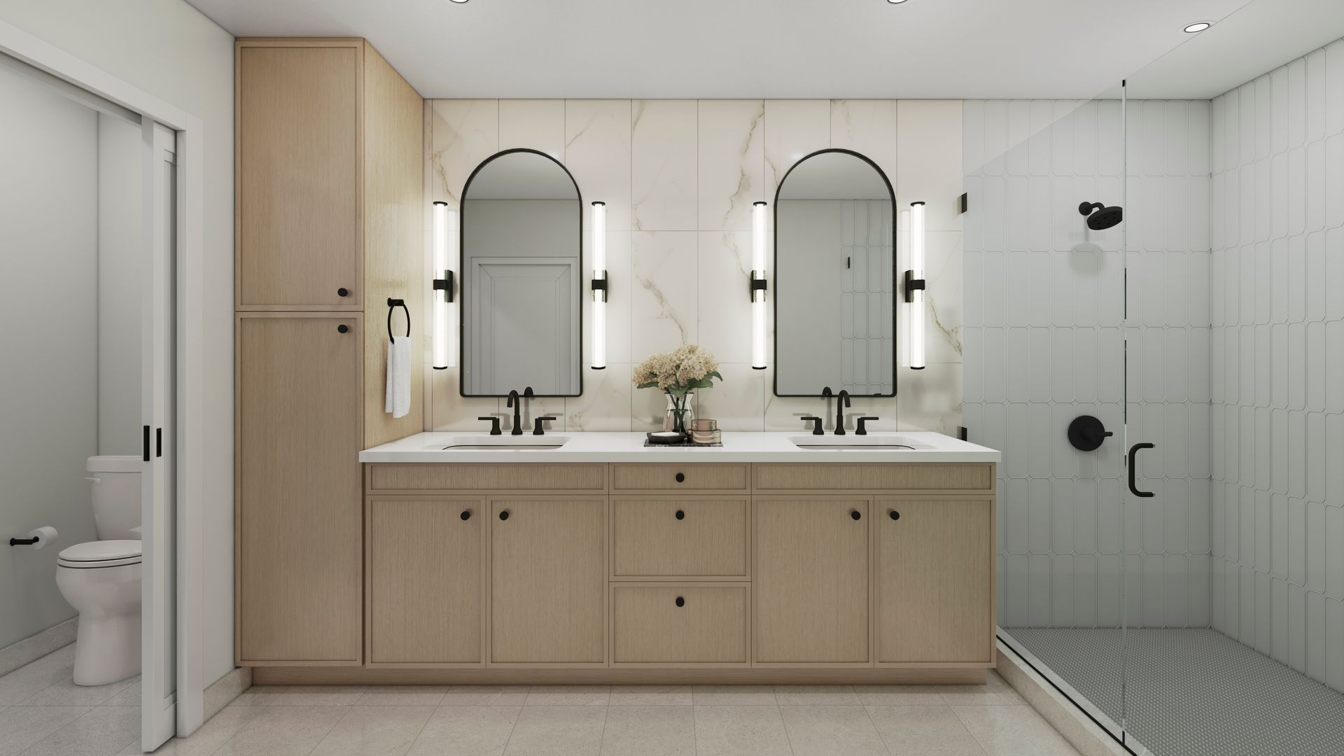 Modern bathroom with double sinks, arched mirrors, glass shower, and neutral tones.
