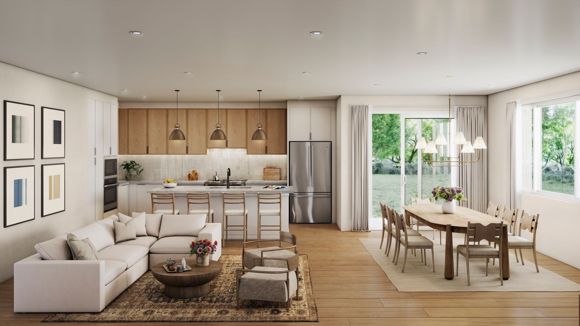Modern open-plan kitchen and dining room with neutral tones and natural light, featuring a sectional sofa, island, and dining table.