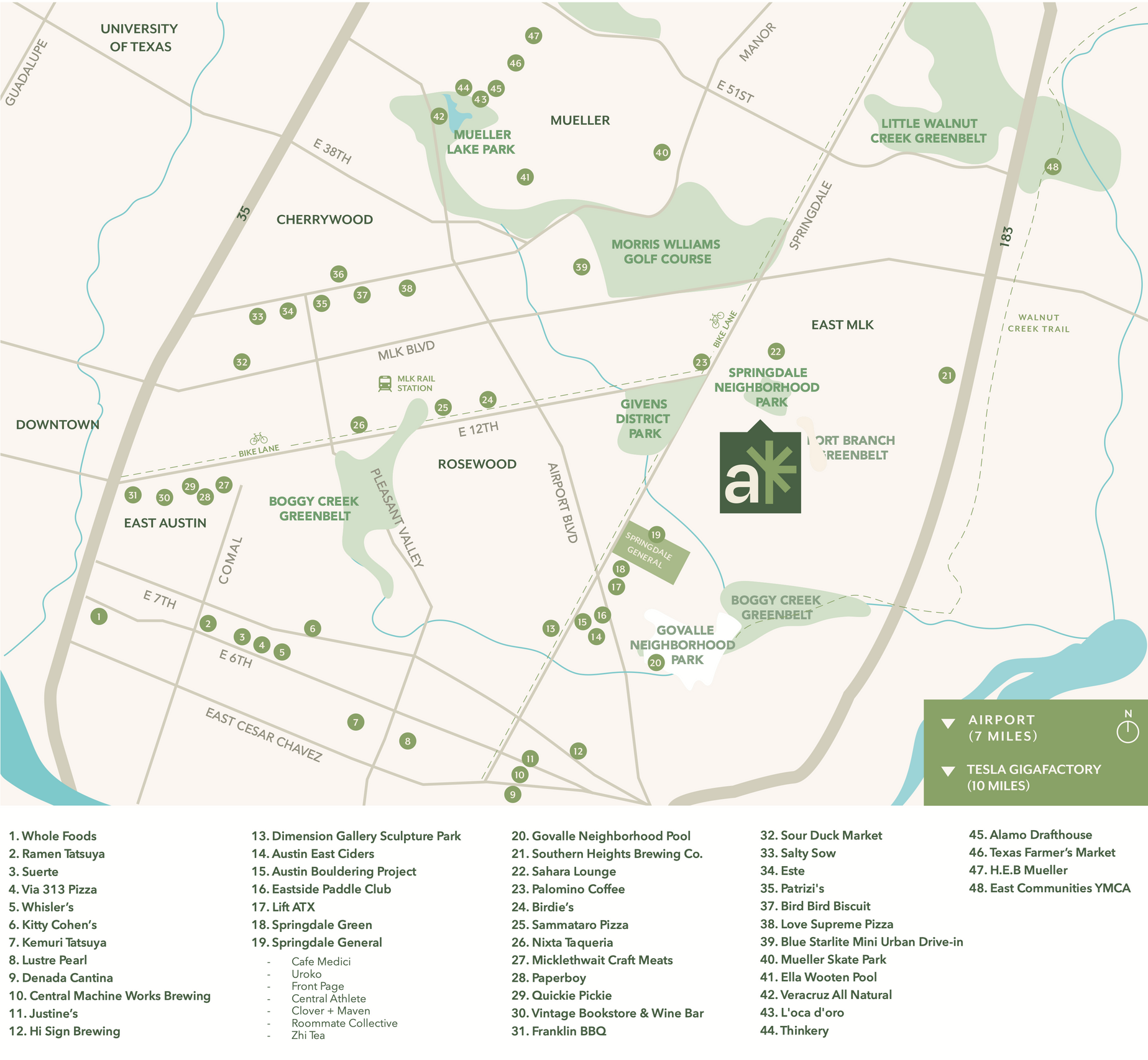 Map of a town with parks and various amenities marked with green dots.