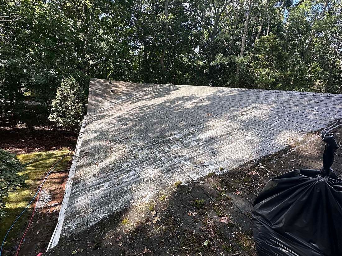 Remove black streaks from your roof with soft washing services from K.O.S. Cleaning on Long Island. 