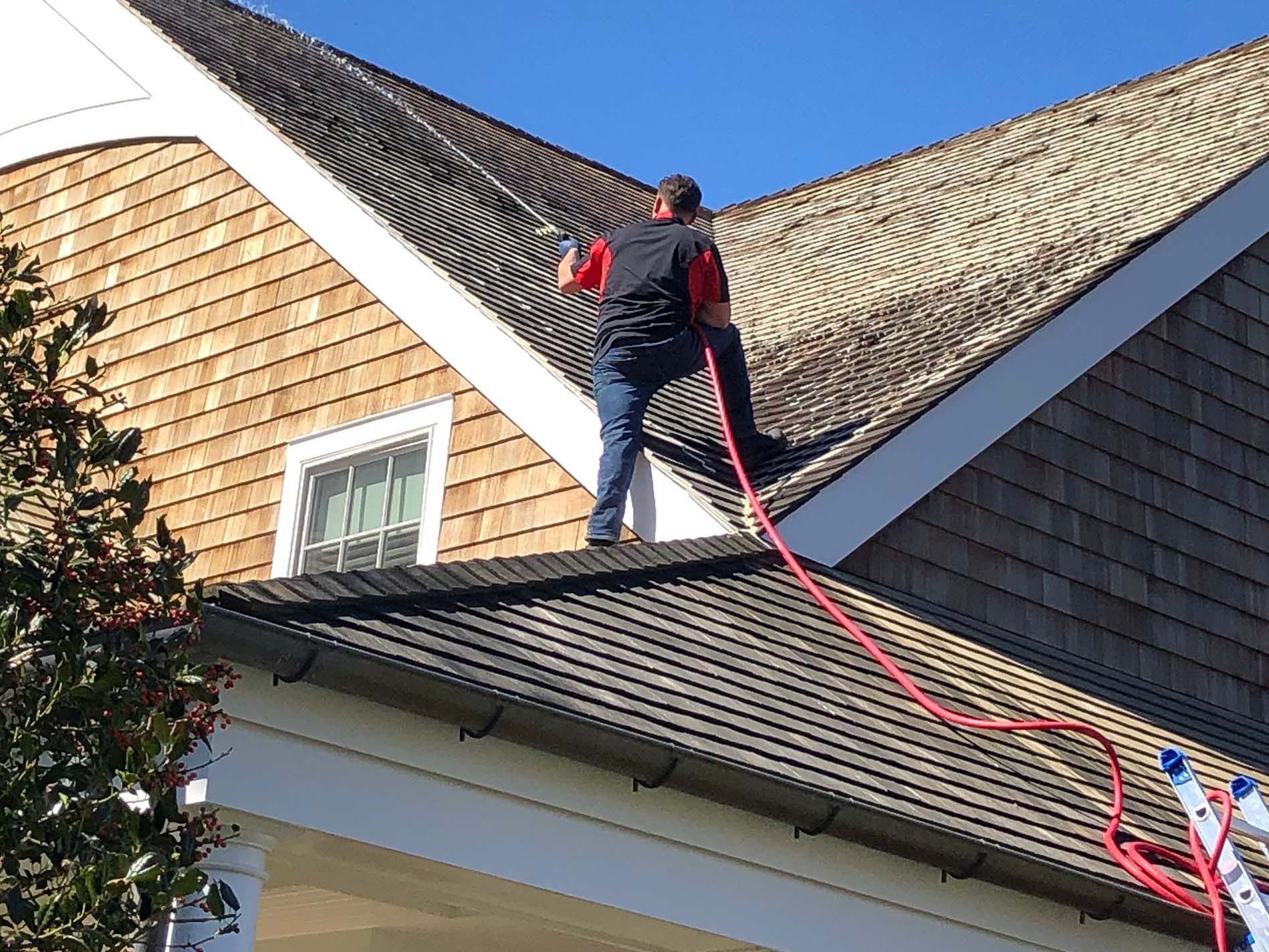 KOS roof soft washing services on Long Island. KOS Cleaning specializes in soft washing cedar shakes