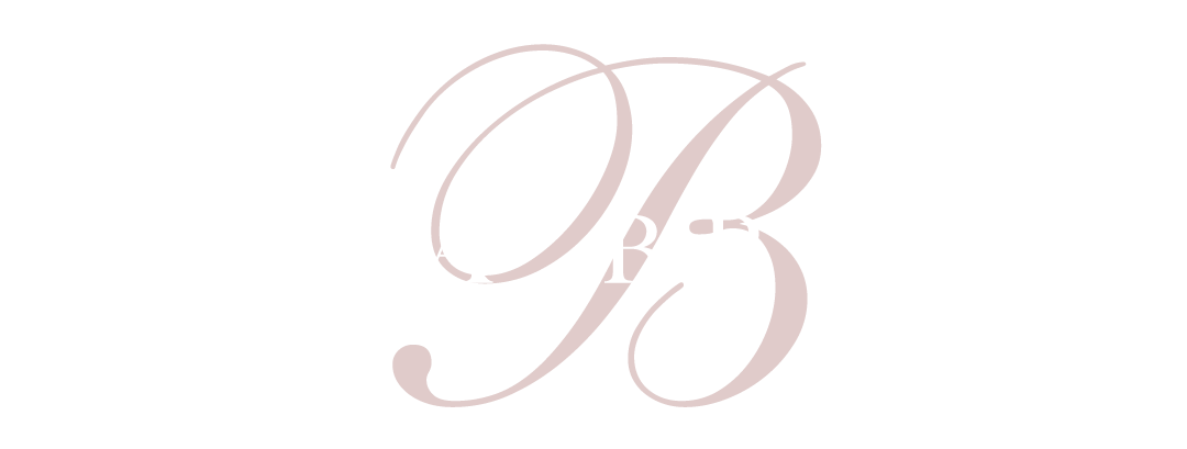 Pale pink intertwined script letters