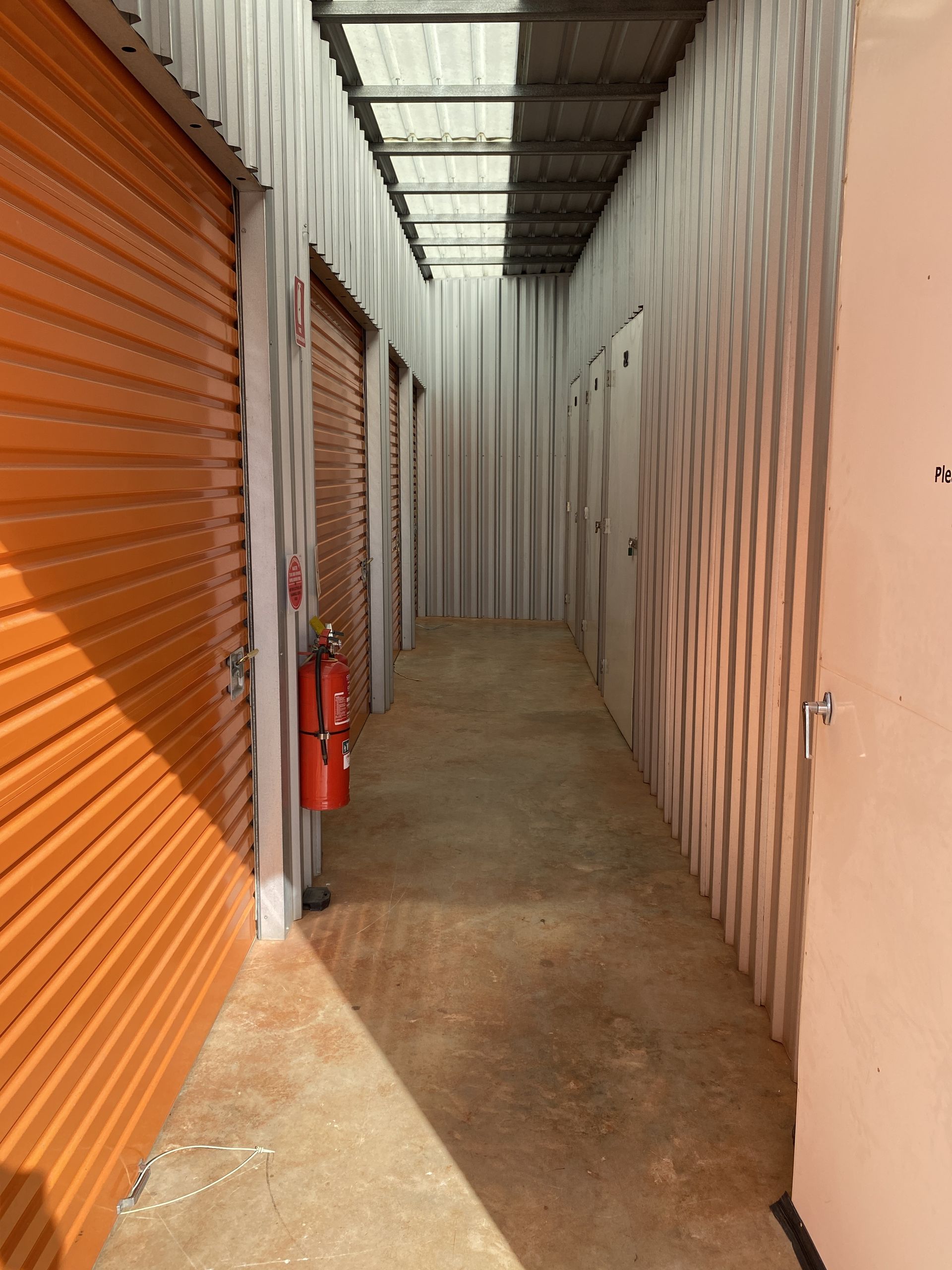 A Building With A Sign That Says ' Warehouse ' On It  — Acacia Mini Storage in Port Macquarie, NSW