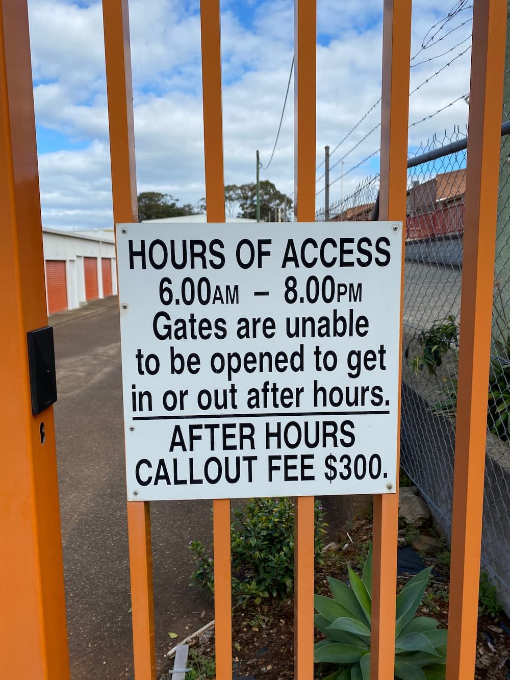 A Sign That Says Hours Of Access On It  — Acacia Mini Storage in Port Macquarie, NSW