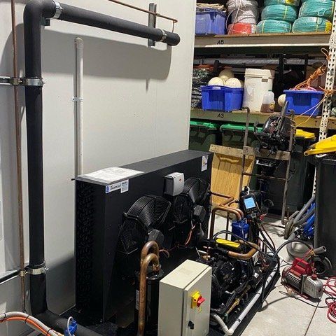 Cooling system for refrigeration room