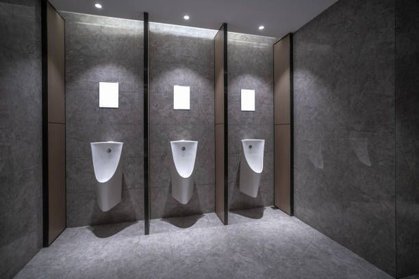 Three Urinals Are Lined Up In A Public Restroom — Laredo, TX — South Central Hardware Inc.
