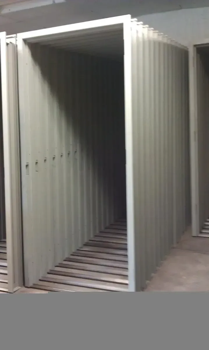 A Row Of Containers Are Stacked On Top Of Each Other In A Room — Laredo, TX — South Central Hardware Inc.