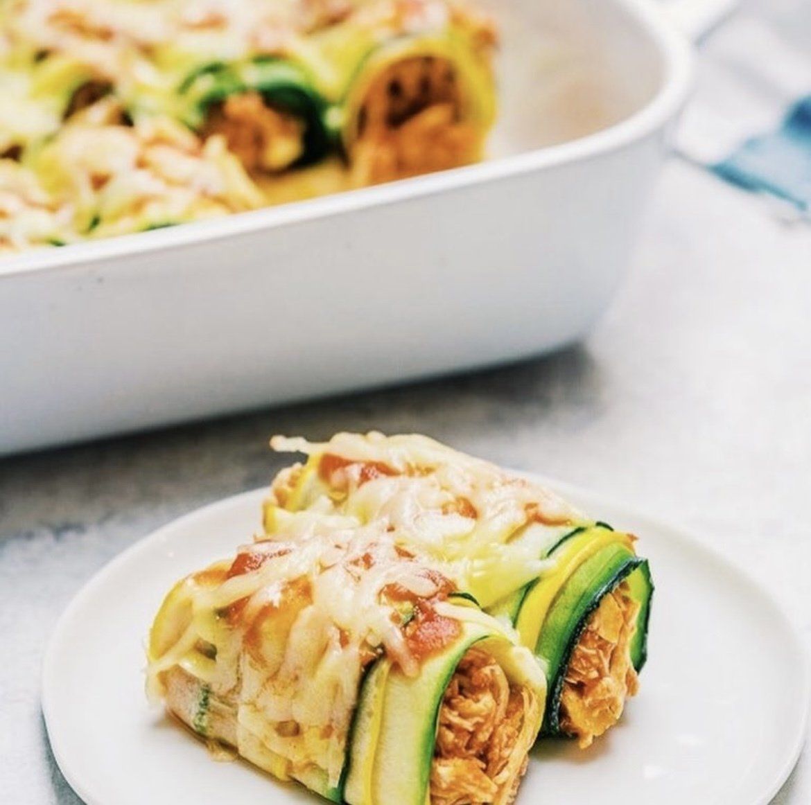 Zucchini Chicken Enchilada Roll-Ups recipe by thrivyest