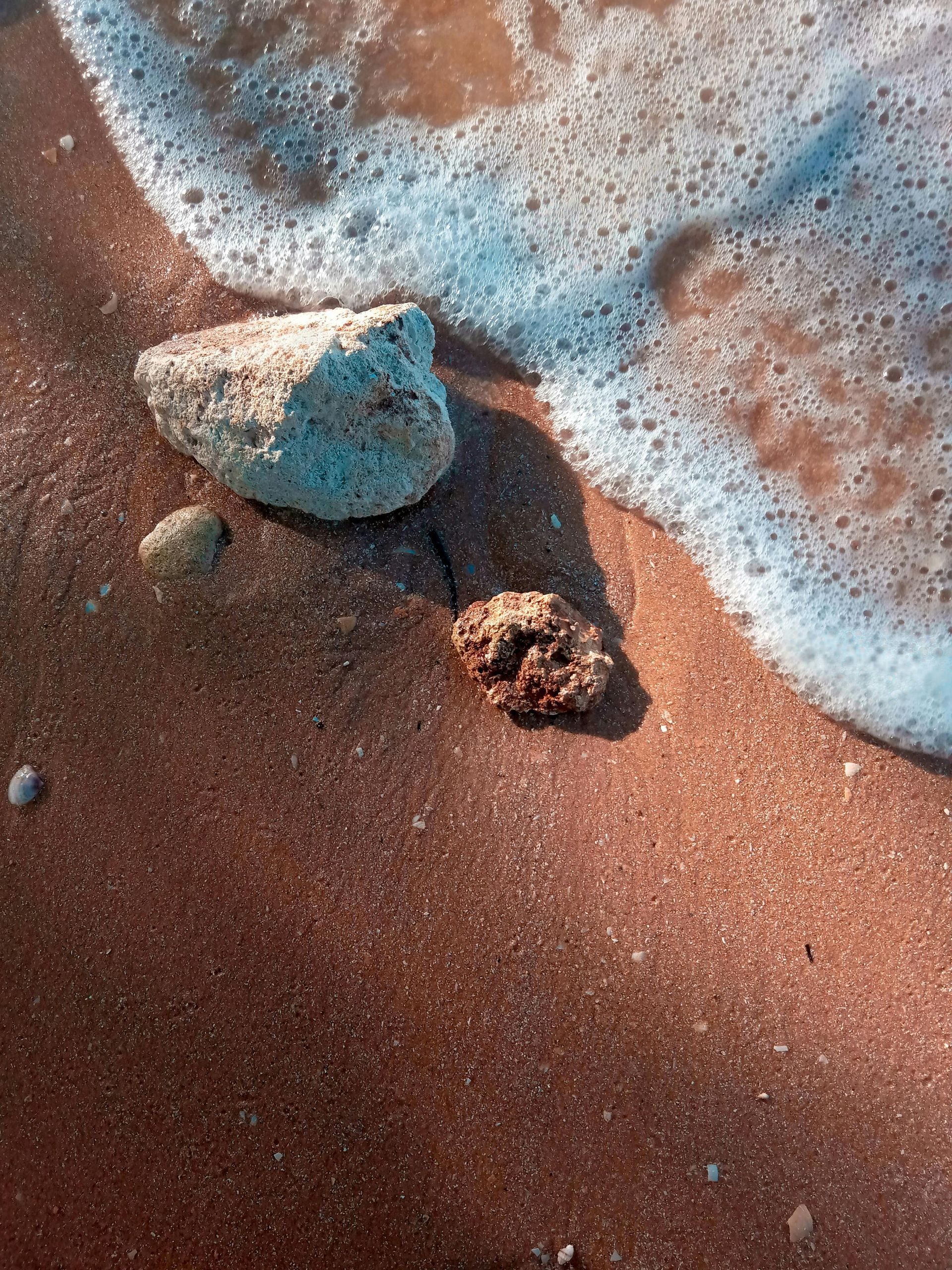 life is hard but you can decide - rocks and sand and ocean 