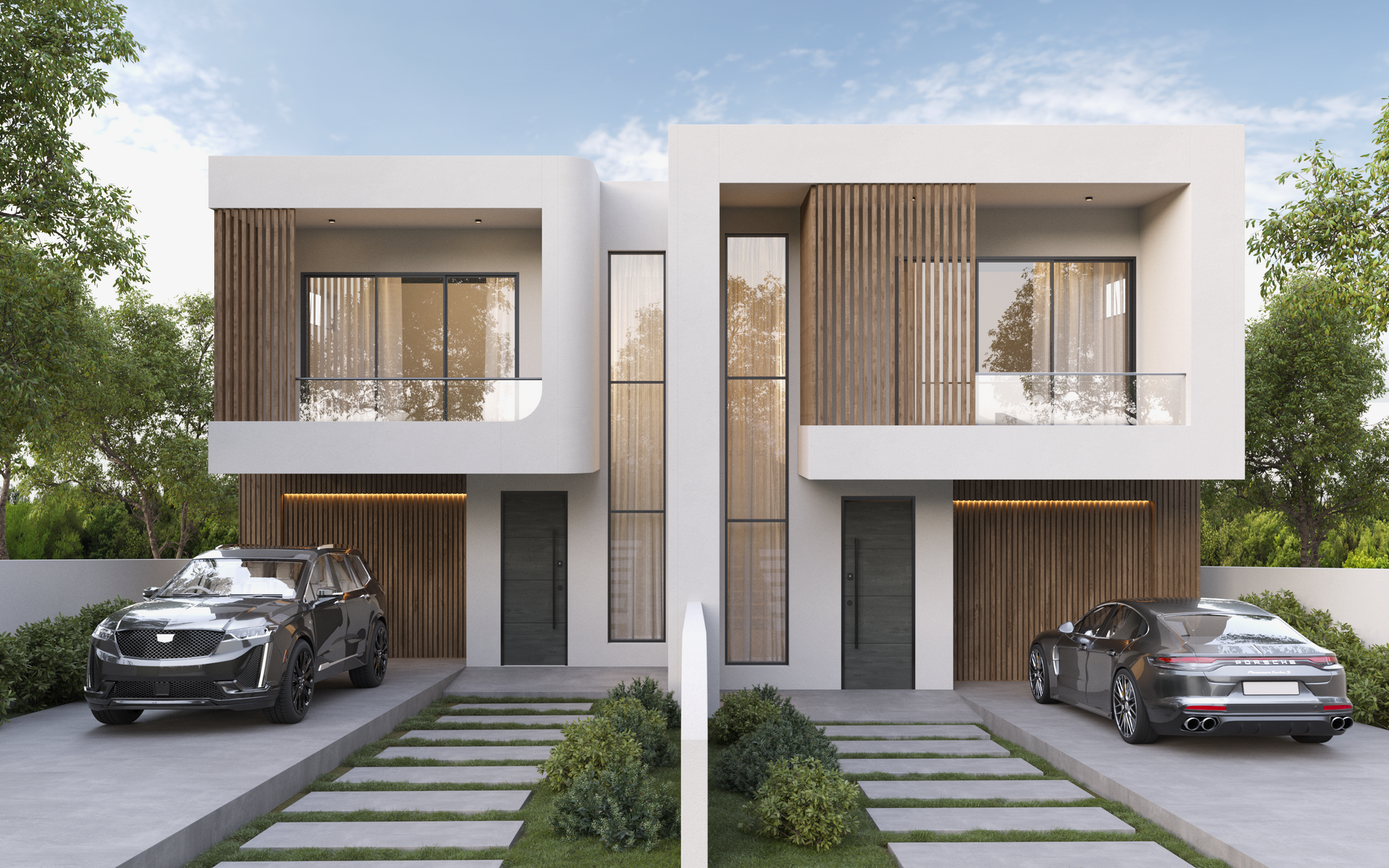 A modern duplex house with white concrete, wood slats, large windows, and cars parked on separate driveways.