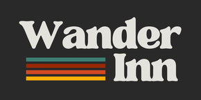A logo for wander inn with a black background