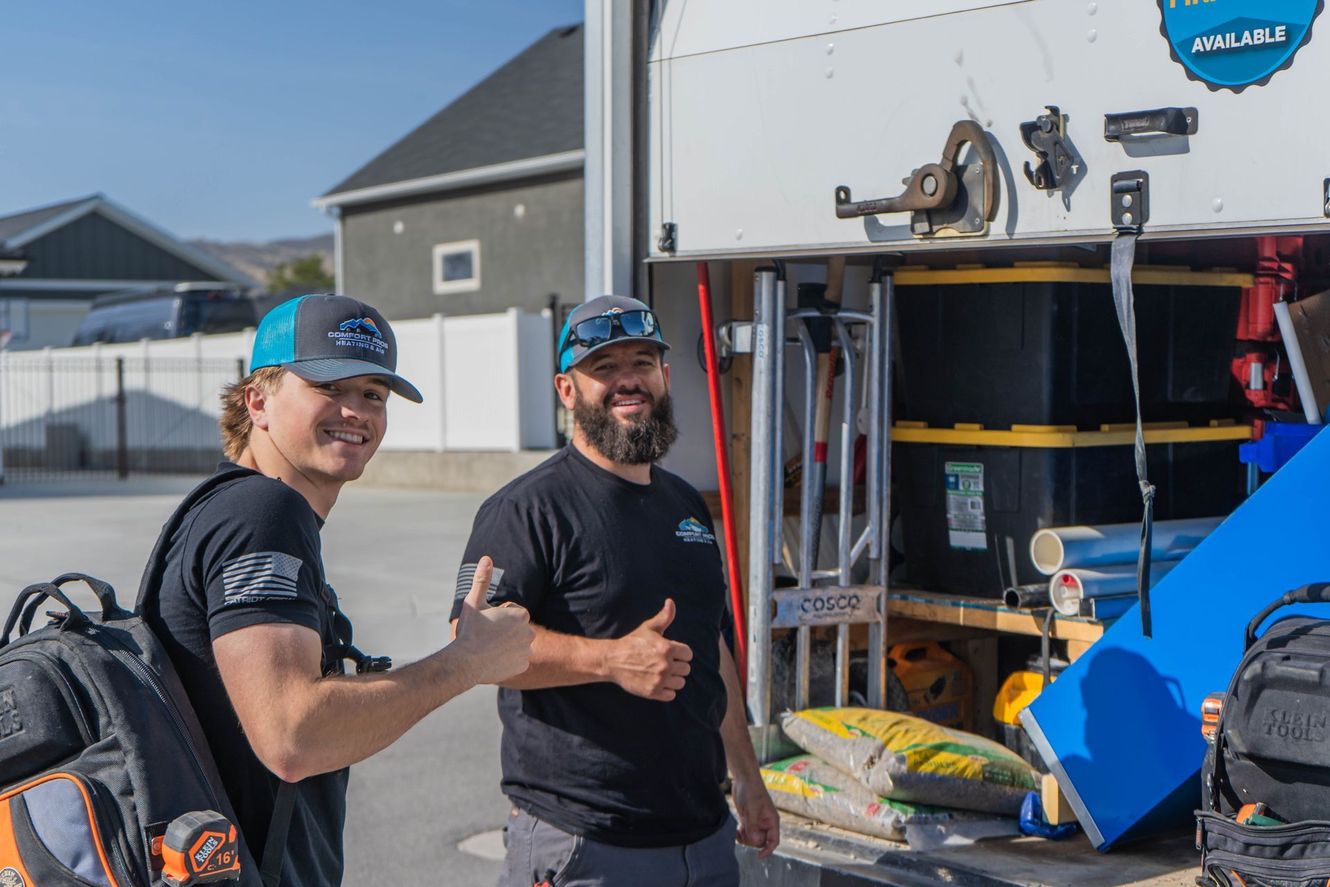 An aerial view of a residential neighborhood with lots of houses and trees.