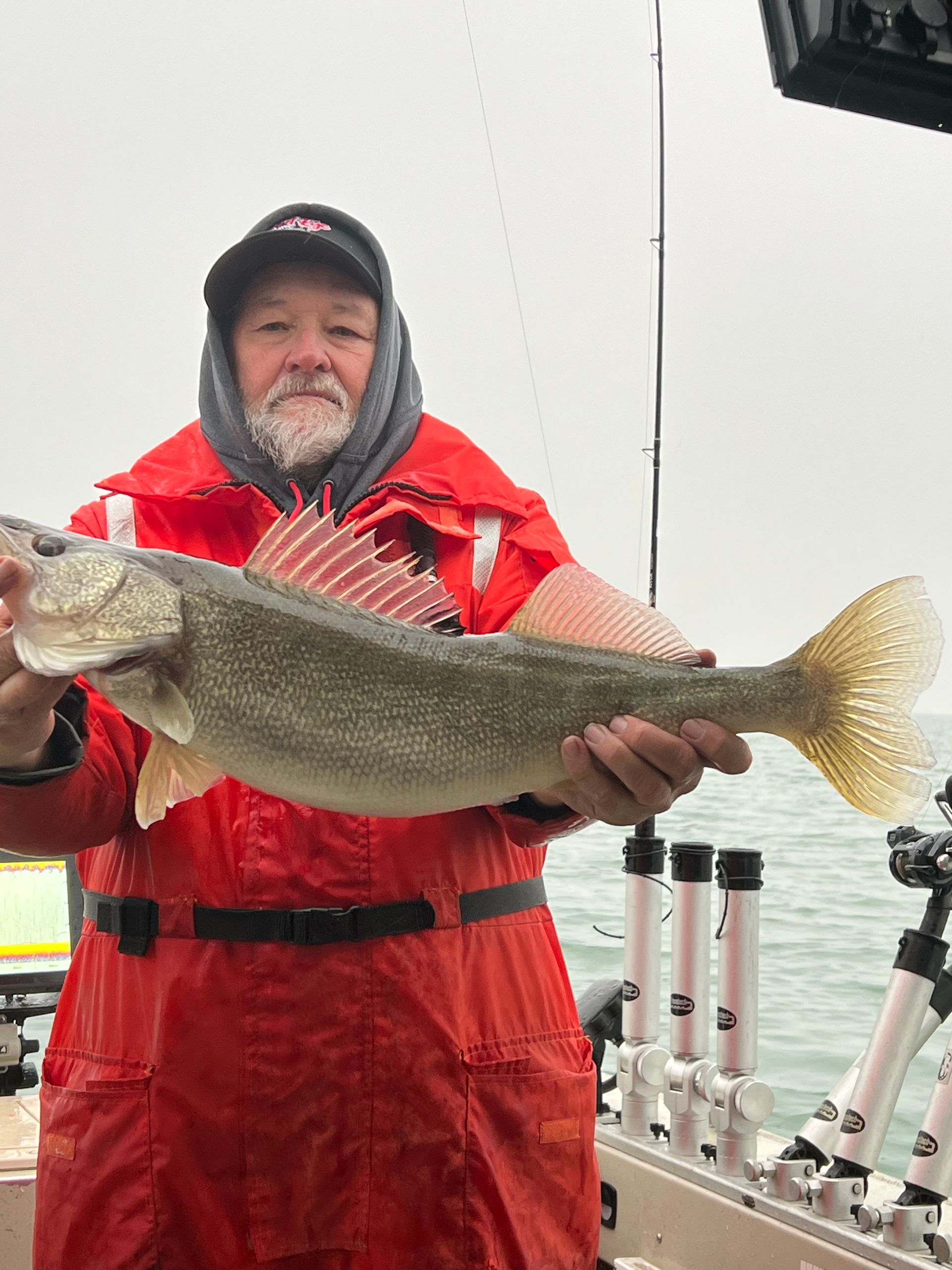 holding a trophy Lake Erie walleye caught out of
Huron Ohio