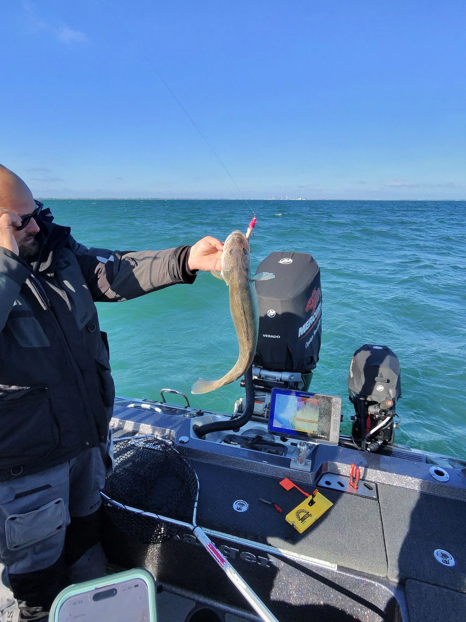  Man holding Lake Erie walleye caught with a Smithwick Perfect 10 and 2oz snap weight   