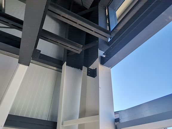 Closeup of steel i-beams at construction project in Ganges, British Columbia.