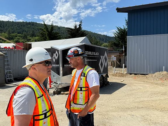 Frank Melo and John Lohan at the Windsor Plywood building project.