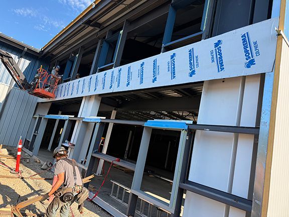 Look at primary framing in steel building project in Ganges.