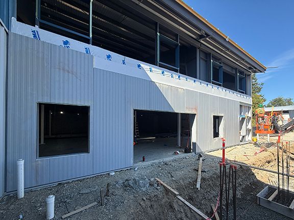 Front of Windsor Plywood Ganges building under construction in the summer of 2025.