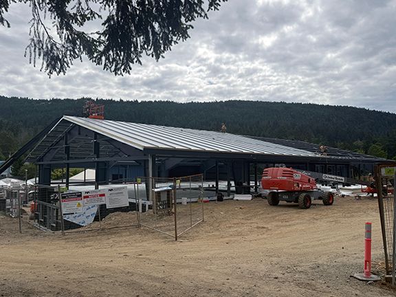Side view of pre-engineered steel building under construction in Ganges.