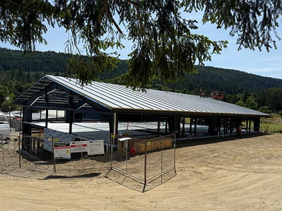 View of the Windsor Plywood building atop the surround hillside.