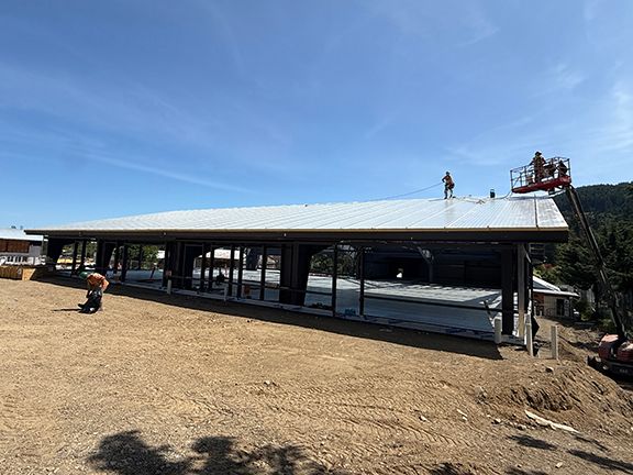 Steel framing supports pre-engineered metal building structures.