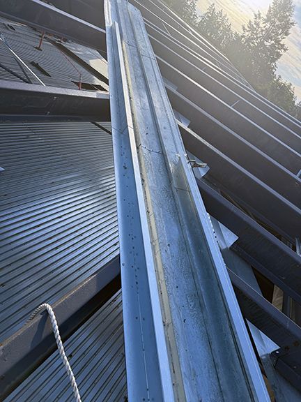 Metal roofing is supported by steel beams for Windsor Plywood.