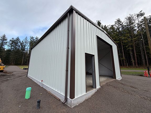 Closeup view of the brown trim on a metal building project in British Columbia.