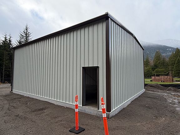 Side view of the completed metal building at Squamish, B.C. cemetery.