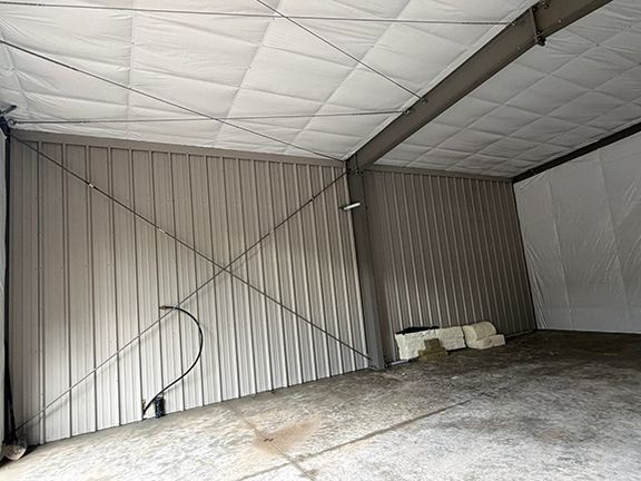 Closeup view of interior wall panels with insulated roofing.