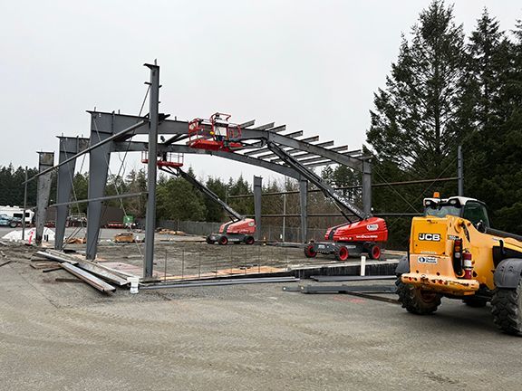 Purlins being installed to roofing system on a Nanaimo building project.