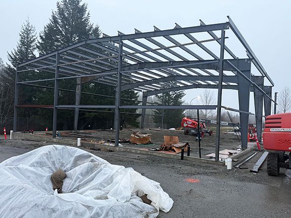 Metal building framing provides stability for industrial structures.