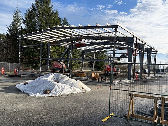 Side elevation view of metal building construction project in British Columbia by Double Black Construction.