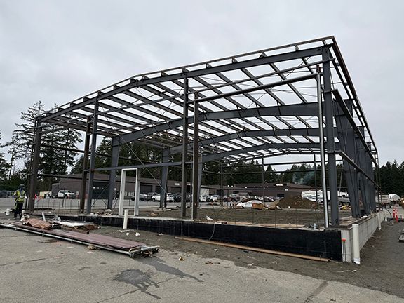 Doorway framing being added to a pre-engineered building design in Nanaimo.