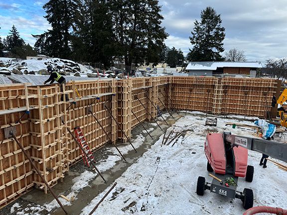 Internal view of completed concrete forms with rebar at Salt Spring Island building construction site.