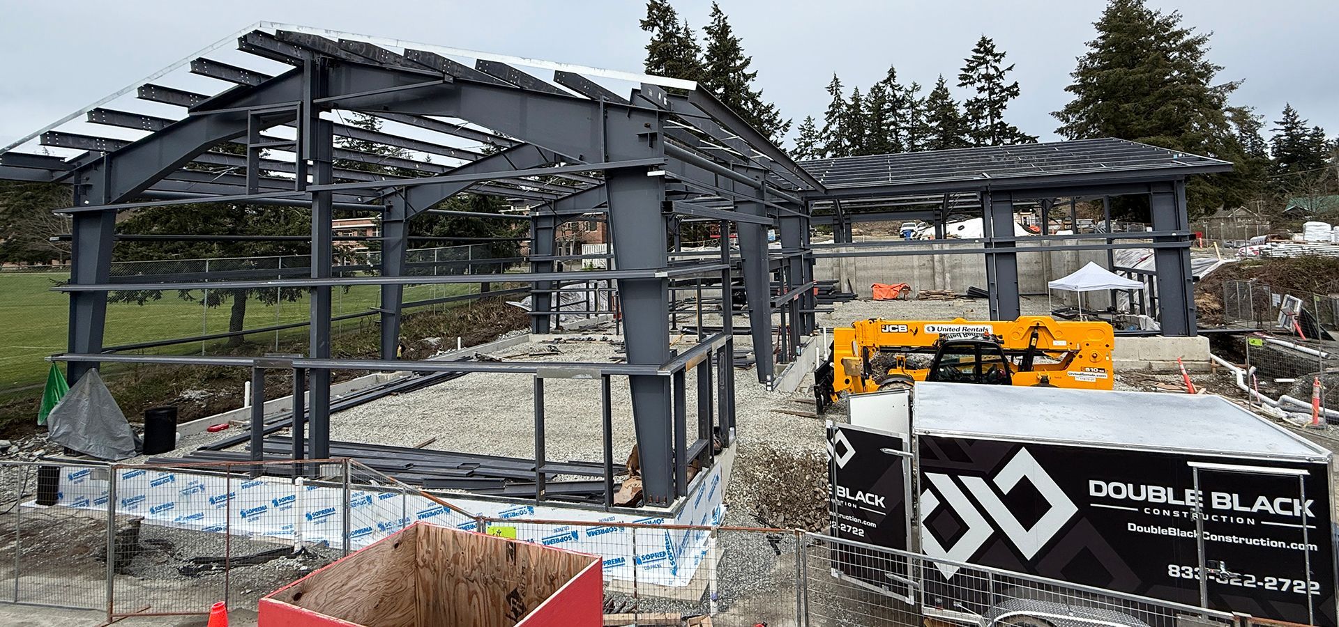 Double Black Construction installs foundation walls and steel framing at building jobsite in BC.