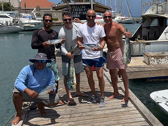 The Double Black Construction leadership team take a break to do deep-sea fishing.