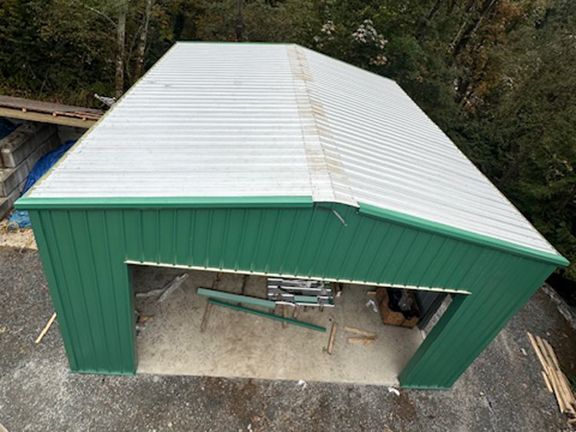 Pre-engineered garage with new roof provided by Double Black Construction in Langley.