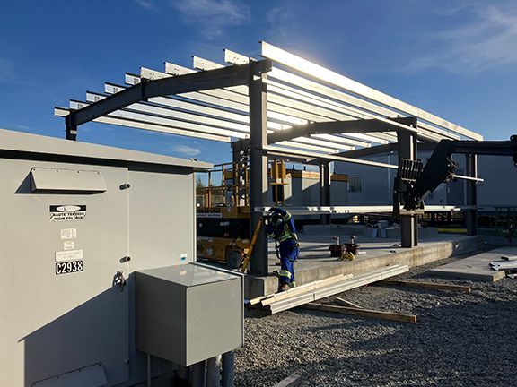 Another view of the steel framing for a storage building being constructed at Vancouver airport.