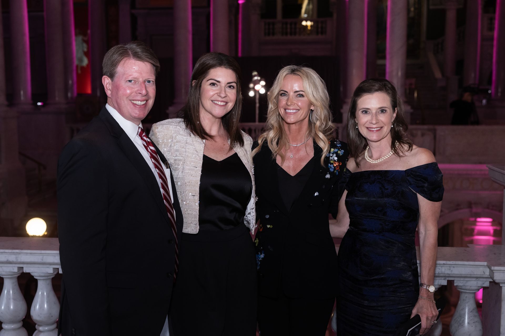 A group of people are posing for a picture together.