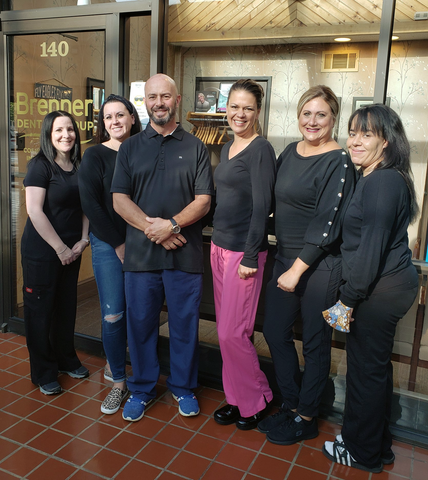 Brenner Dental Group team in front of their office.