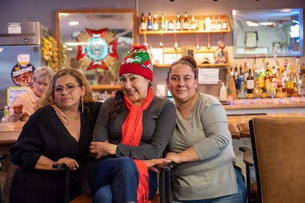 Three women sitting at a bar — Lafayette, CO — Clean Conscience
