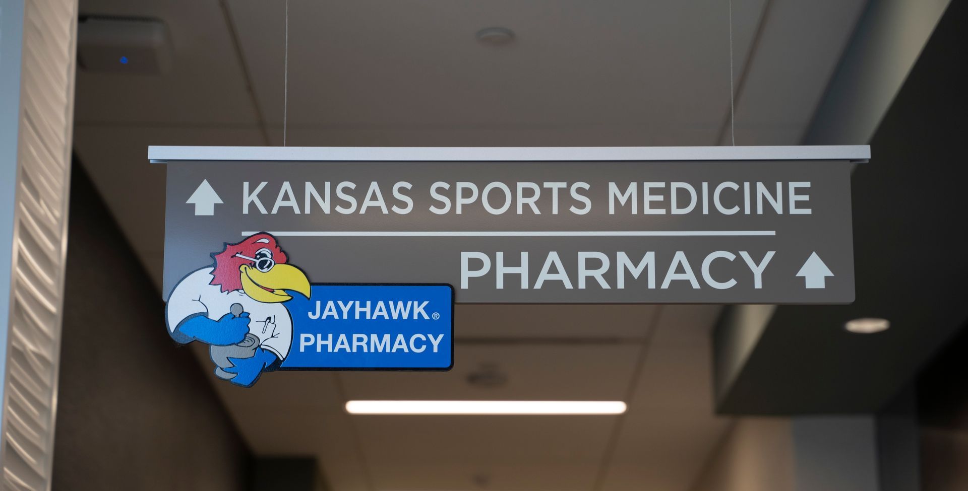 Professional photograph of asign at Jayhawk Pharmacy.