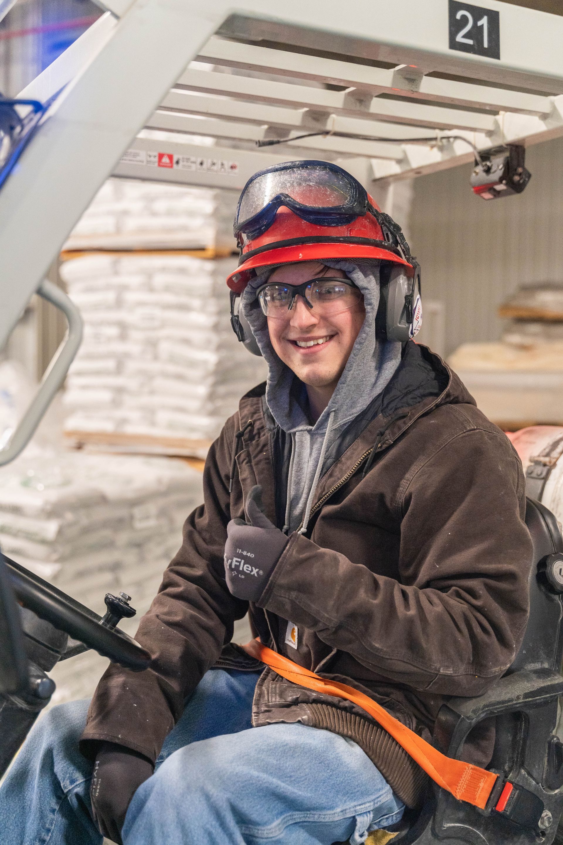 Professional advertisement of man working in a factory that was taken by KMG.