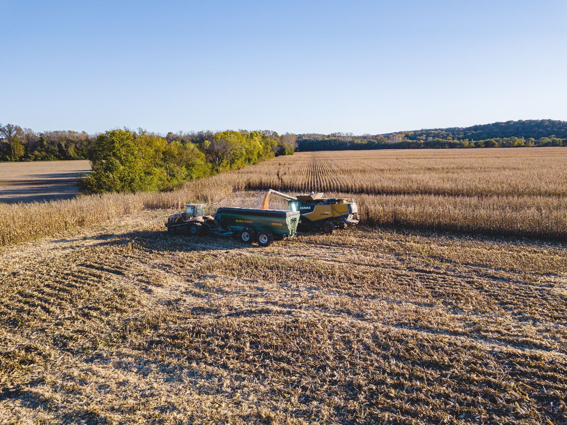 Drone photograph of wheat fields being harvested taken by KMG.