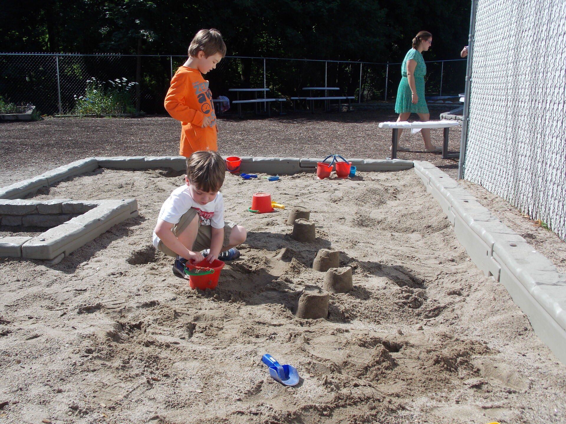 two child working outdoors