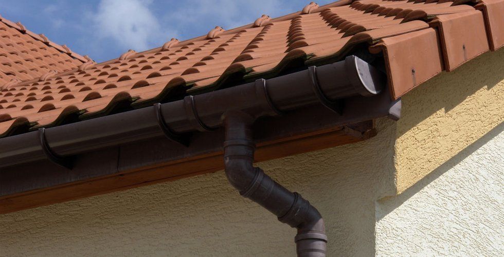 Brown Roof and Brown Frame Gutter — St Albans — Complete Guttering Services