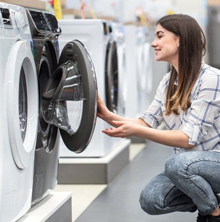 Girl Looking for Washing Machine — Canberra, ACT — Renewed Appliances - Manhos